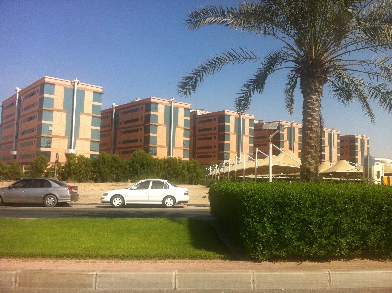 Campus buildings and open ground in Dubai International Academic City, photographed in 2012.