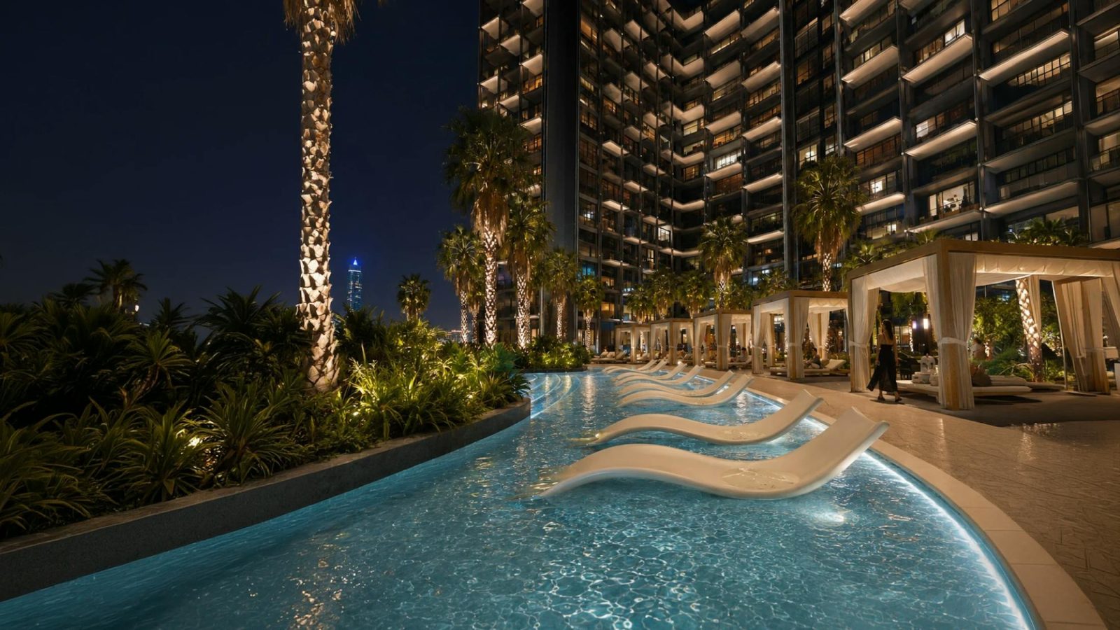 Pool and loungers at Binghatti Wraith by Binghatti Developers