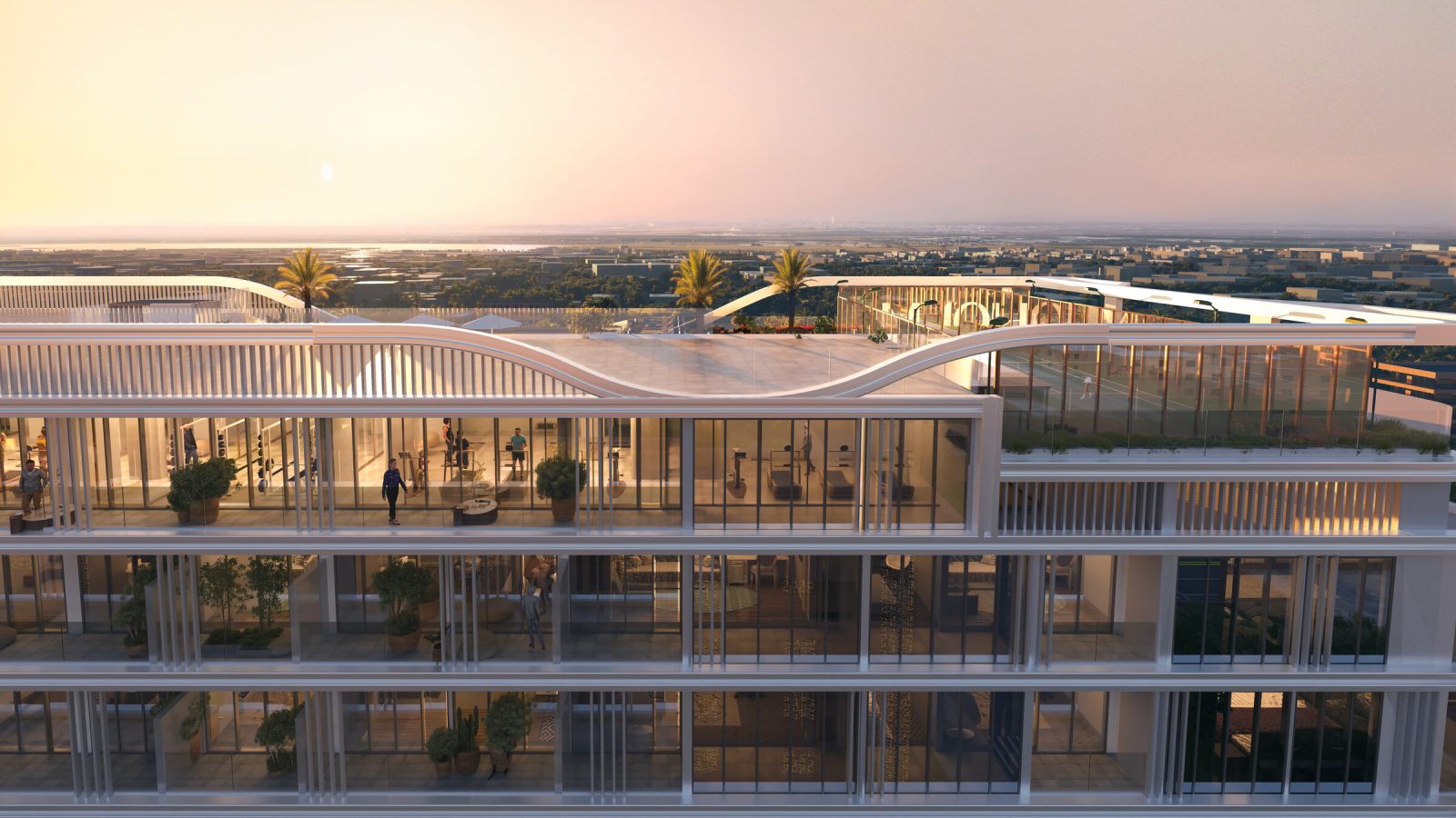 Glazed rooftop gym and terrace levels at LINEA by HOLM at sunset, with the padel court beyond