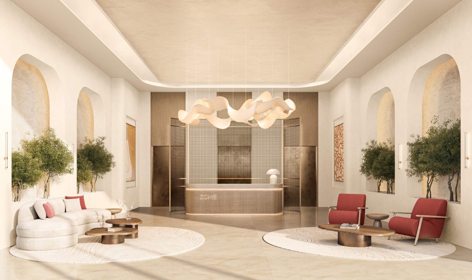 Lobby at SOMA Residences with a reception desk, arched alcoves, planted trees and seating