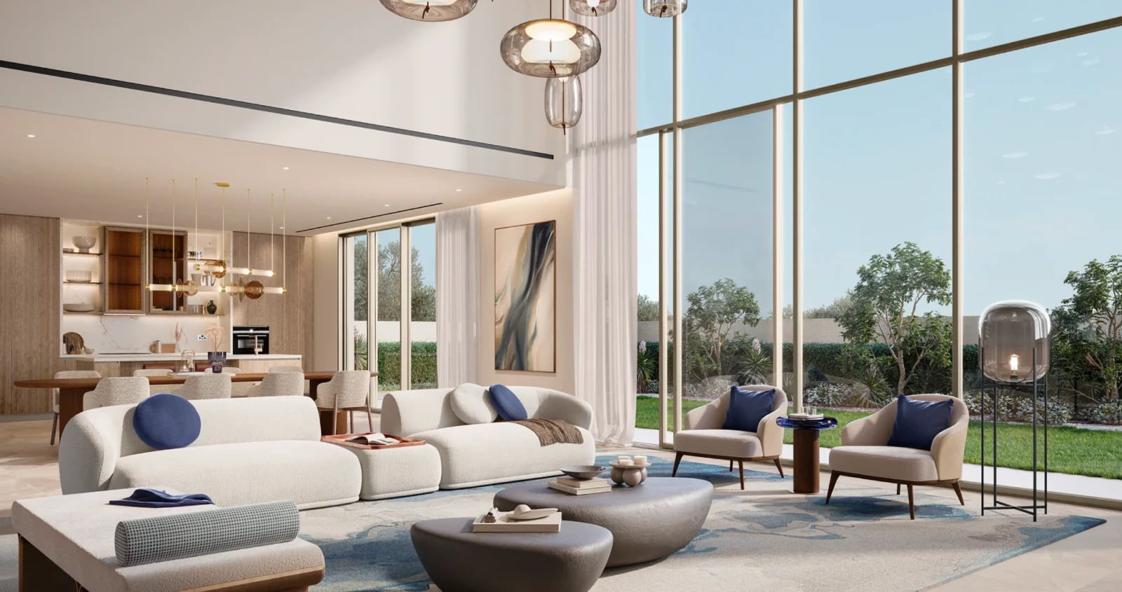 Interior render of a Talay villa living room with double-height ceiling, pendant lights, an open kitchen with island beyond, and full-height glazing onto a walled garden